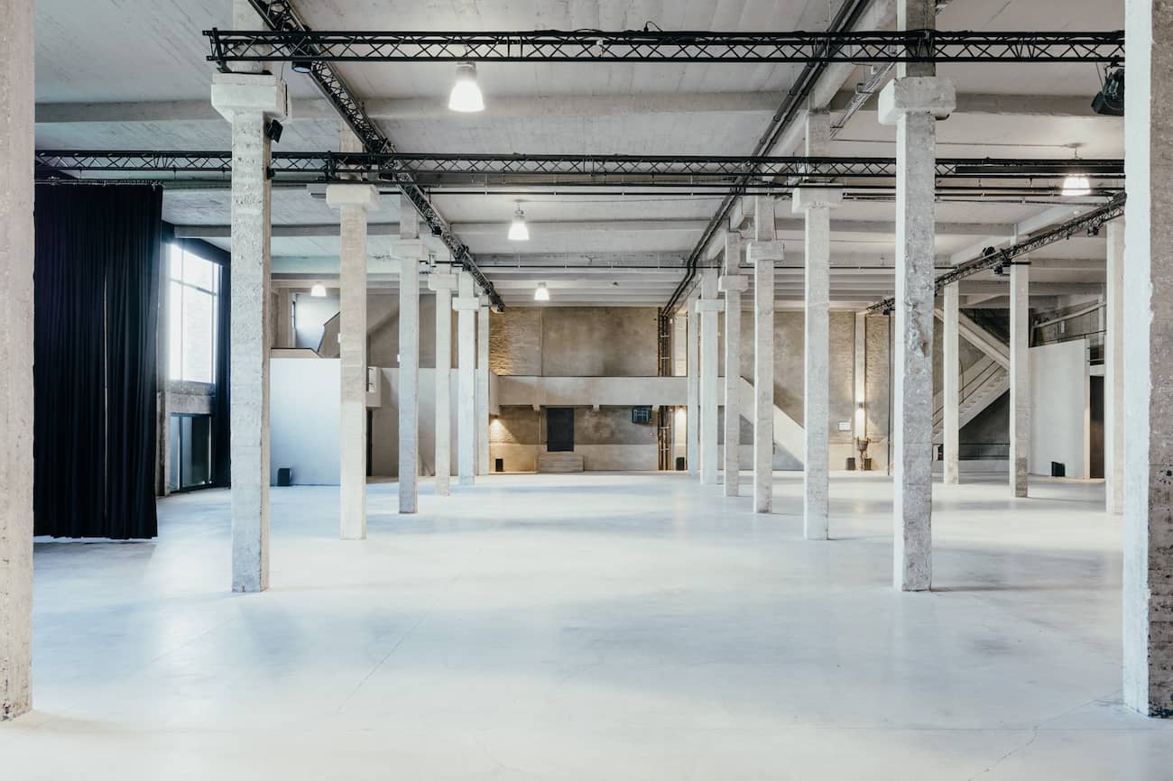 SILO Brussels industrial interior with soaring ceilings and exposed steel beams